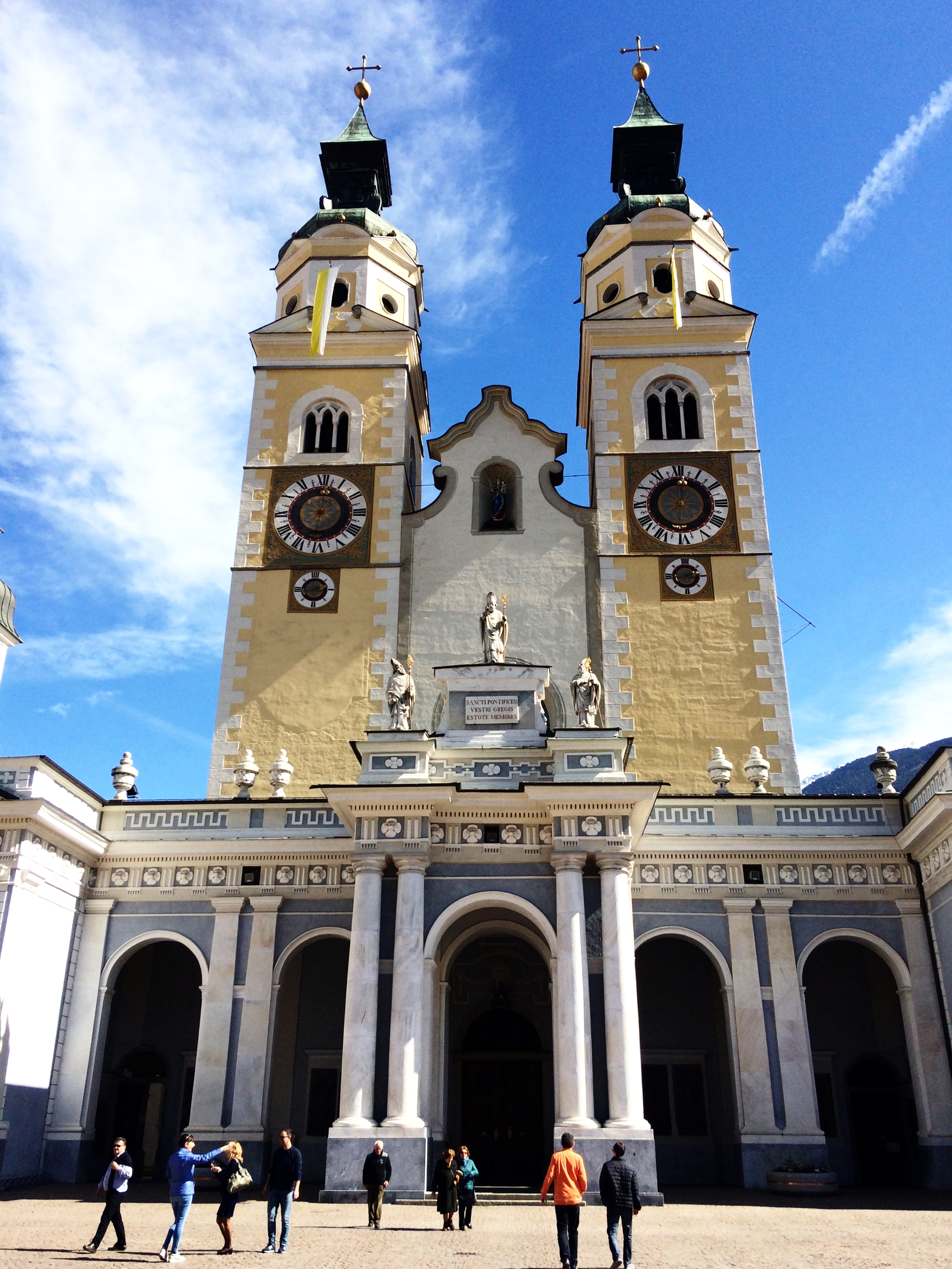 Christian and his brother (far right) walking towards the Brixner Dom in Brixen, South Tyrol.