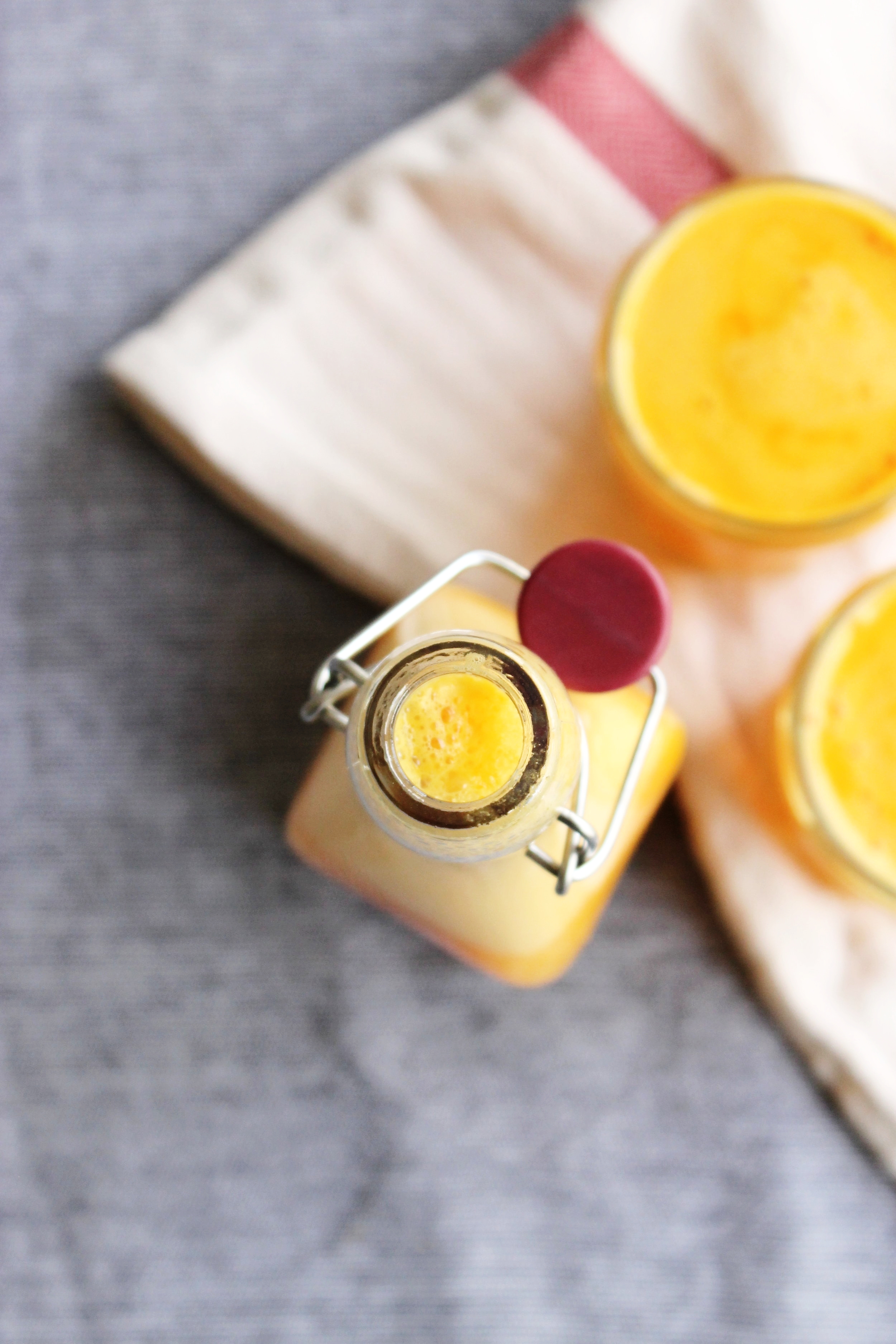 Uplifting orange and grapefruit juice with fresh turmeric and ginger | Beloved Kitchen