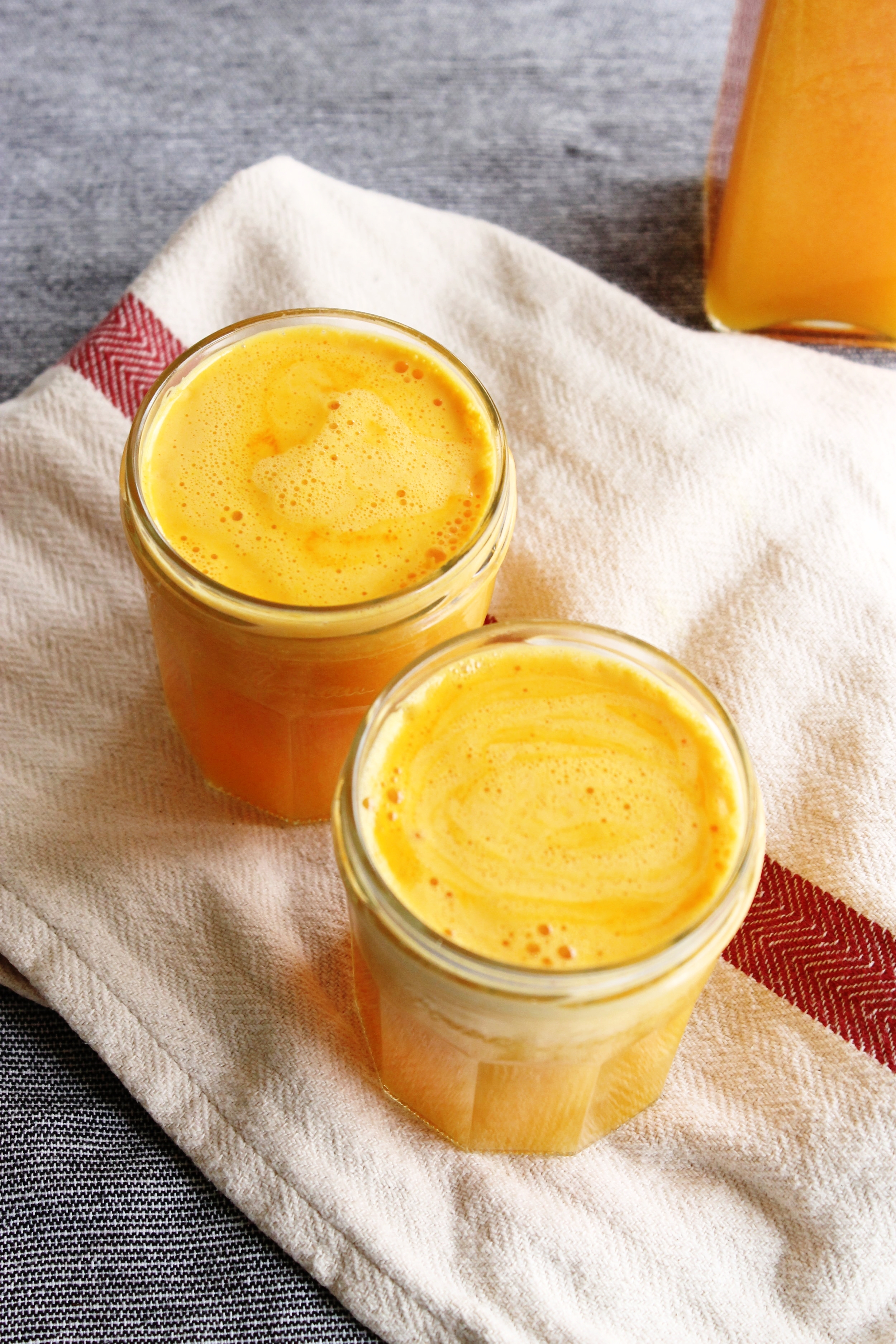 Uplifting orange and grapefruit juice with fresh turmeric and ginger | Beloved Kitchen
